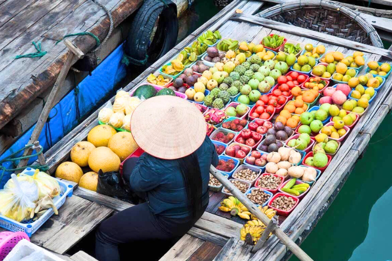 Boats selling fruit on the Western floating market
